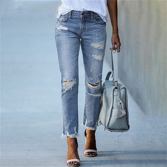 Stretch distressed skinny mid-rise denim jeans for women | Edgeline -1